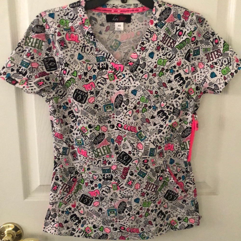 Koi lite neon scrub top